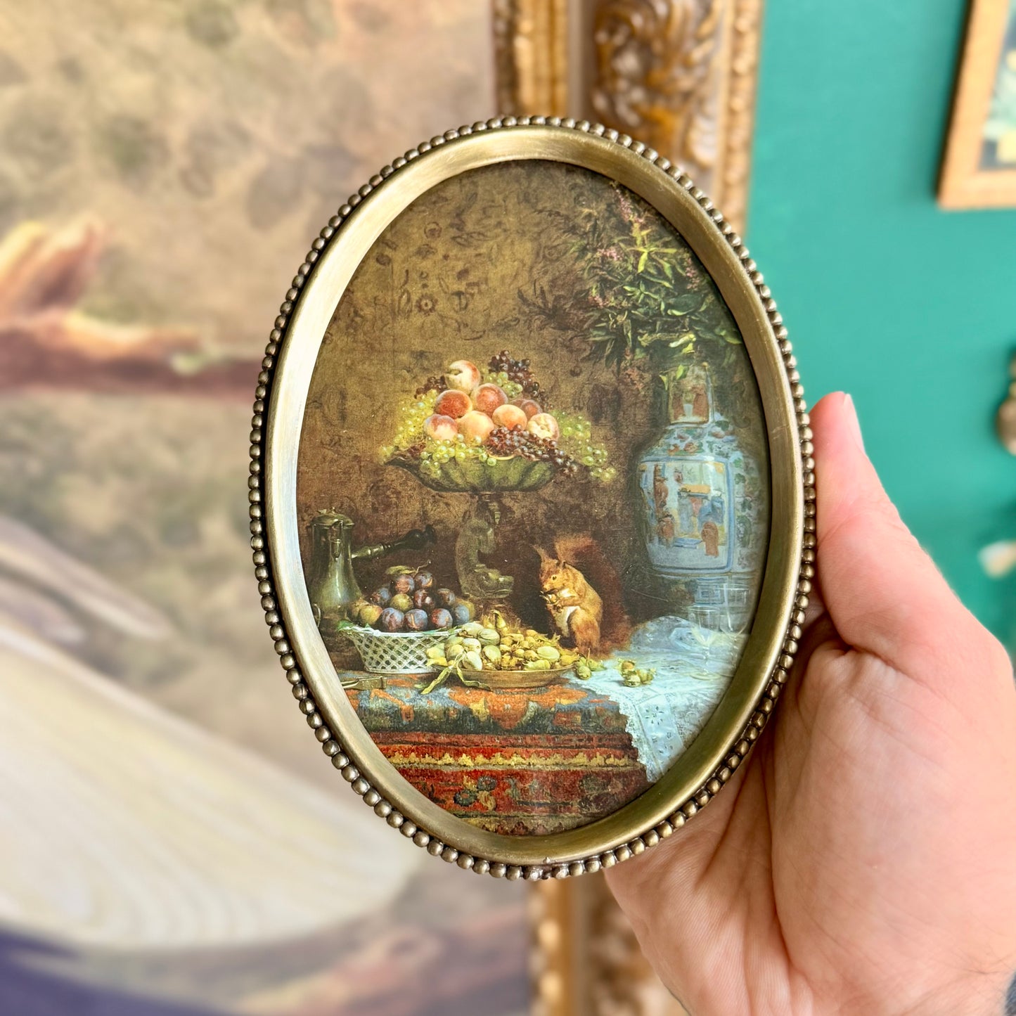 A detailed shot of the beaded brass frame, showcasing its aged patina and vintage-inspired craftsmanship.