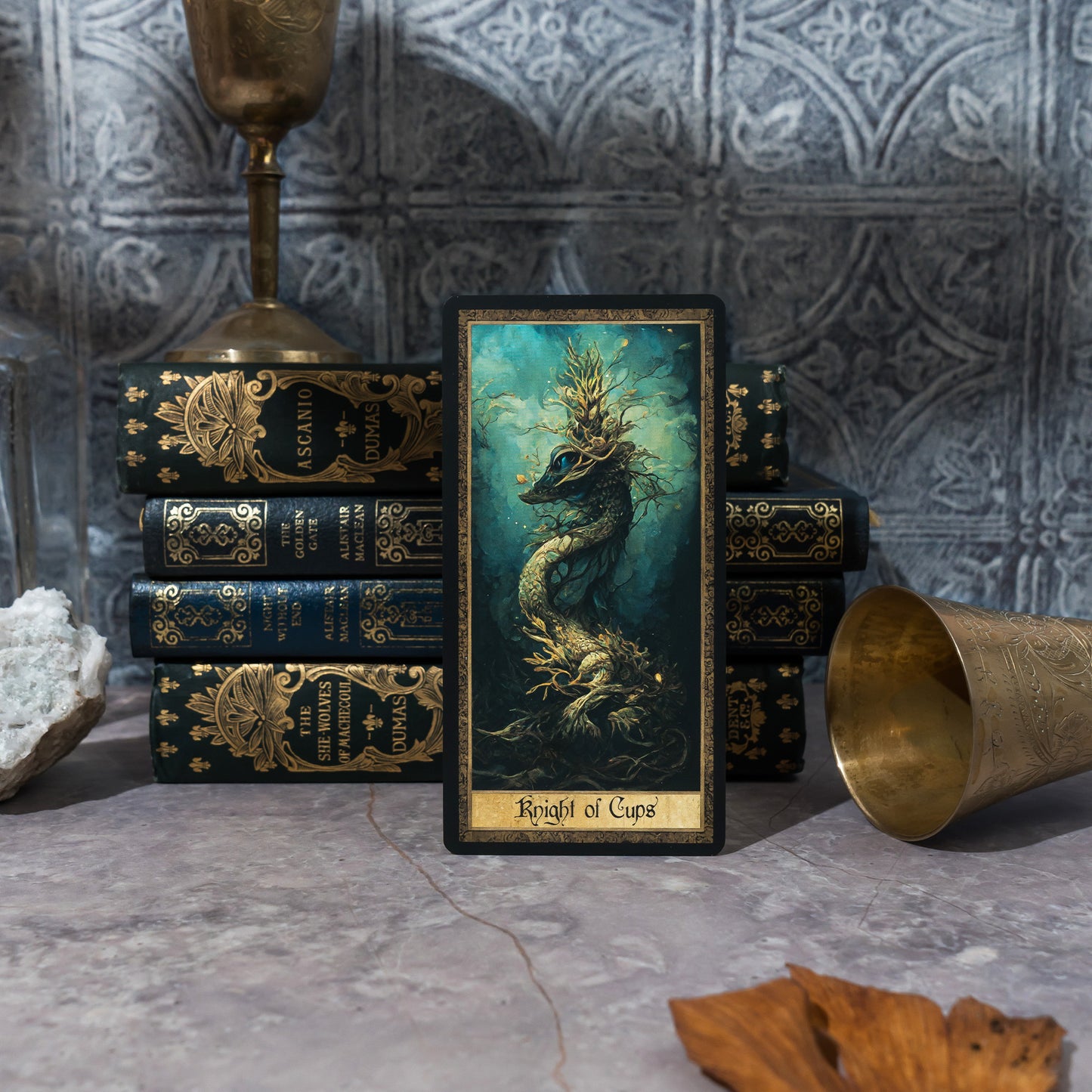 Hand holding a card from the Shadow Work Tarot Deck during a tarot reading, with soft lighting and a background of Victorian-era decor, emphasizing the deck's use in personal reflection and spiritual practice.