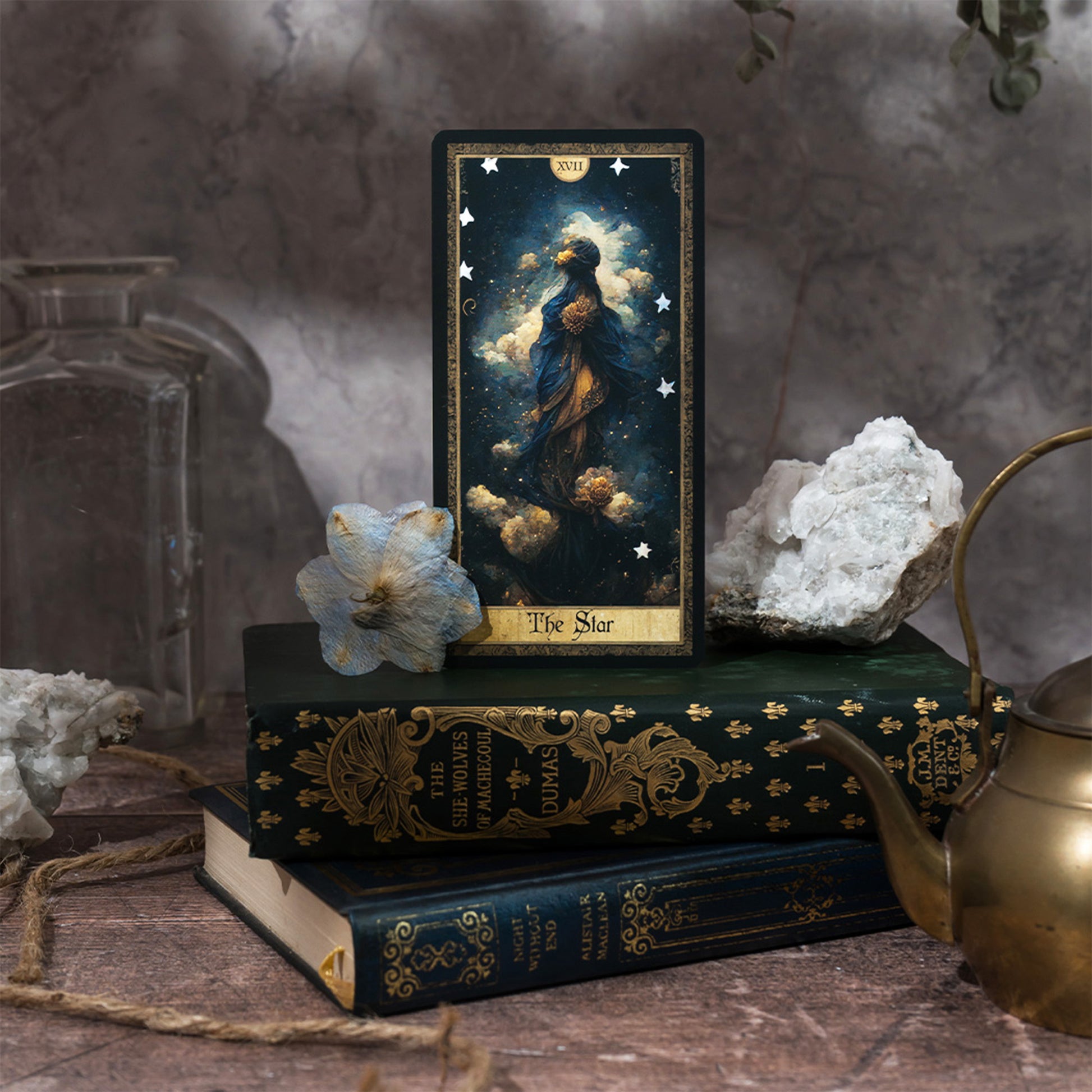 A longer-than-standard tarot deck with gold foil-edged cards showcasing intricate artwork focused on shadow work and inner healing. The cards are arranged next to an enhanced guidebook and a matching storage box.