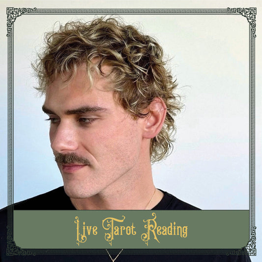 Man with curly hair and mustache, wearing a black shirt, with text 'Live Tarot Reading' at the bottom.