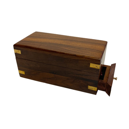 Wooden jewelry box with a gold clasp on a white background